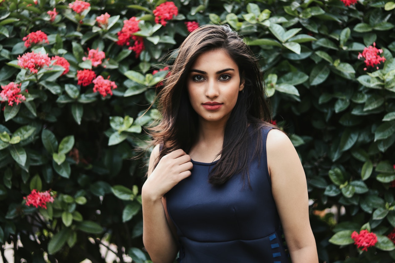 woman standing in flowers